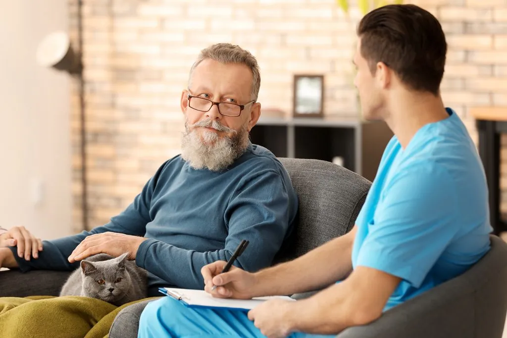 Caregiver offering support to a senior